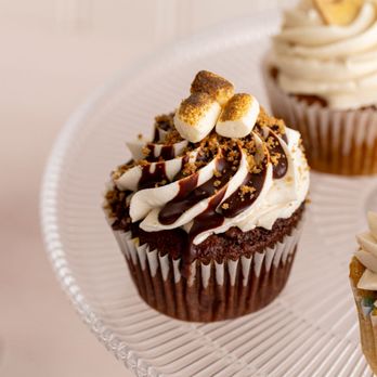 Petunia's Pies & Pastries signature dishes Birthday Cake Cupcake
Cinnamon Roll
Lemon Blackberry Poppy Seed